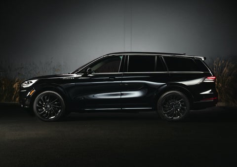 A 2024 Lincoln Aviator® SUV is shown in the Infinite Black exterior color | Zeigler Lincoln of Kalamazoo in Kalamazoo MI