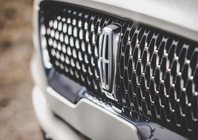 The grille of the 2024 Lincoln Aviator® Reserve model with an eye-catching repeated field of Lincoln Star logo shapes | Zeigler Lincoln of Kalamazoo in Kalamazoo MI