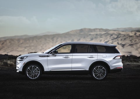 A Lincoln Aviator® SUV is parked on a scenic mountain overlook | Zeigler Lincoln of Kalamazoo in Kalamazoo MI