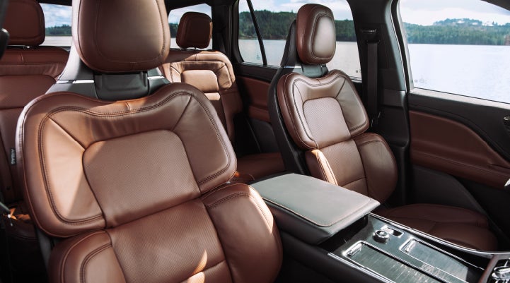 The front row's Perfect Position Seats in a 2024 Lincoln Aviator® Reserve model with Ebony Roast interior | Zeigler Lincoln of Kalamazoo in Kalamazoo MI