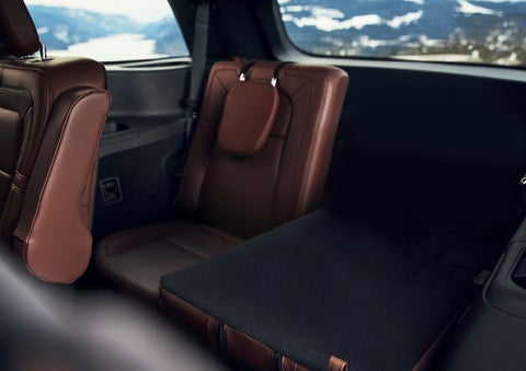 The left rear seat of a 2024 Lincoln Aviator® SUV is shown folded flat for additional cargo space | Zeigler Lincoln of Kalamazoo in Kalamazoo MI