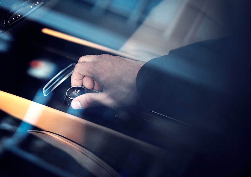 The driver of a 2023 Lincoln Corsair® SUV is shown adjusting the drive mode. | Zeigler Lincoln of Kalamazoo in Kalamazoo MI