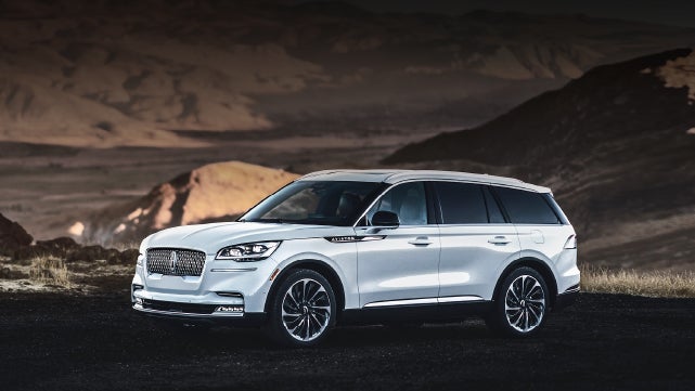 A 2024 Lincoln Aviator® SUV is parked at a mountain overlook | Zeigler Lincoln of Kalamazoo in Kalamazoo MI