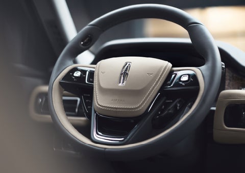 The intuitively placed controls of the steering wheel on a 2024 Lincoln Aviator® SUV | Zeigler Lincoln of Kalamazoo in Kalamazoo MI