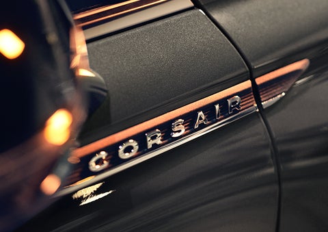 The stylish chrome badge reading “CORSAIR” is shown on the exterior of the vehicle. | Zeigler Lincoln of Kalamazoo in Kalamazoo MI
