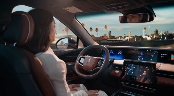 A person is shown driving hands-free on the highway with available Lincoln BlueCruise technology. | Zeigler Lincoln of Kalamazoo in Kalamazoo MI