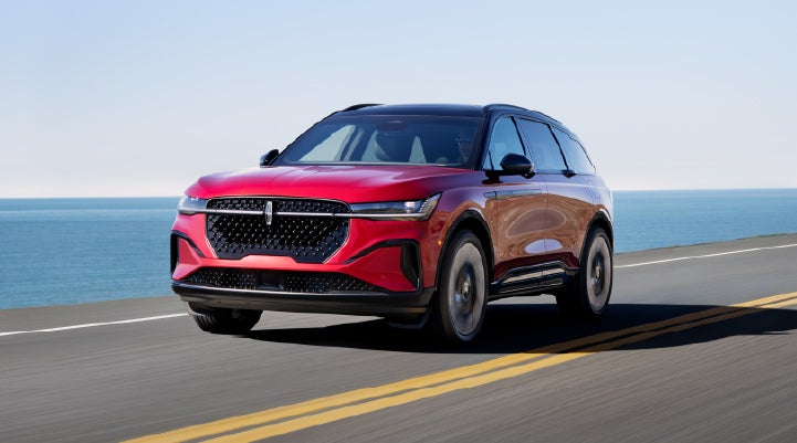 A 2025 Lincoln Nautilus® SUV is being driven on a seaside roadway. | Zeigler Lincoln of Kalamazoo in Kalamazoo MI