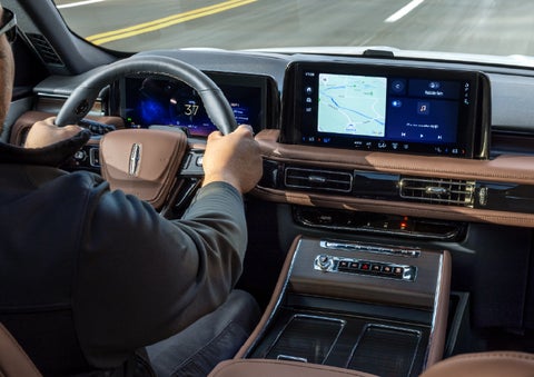 A person is driving a 2026 Lincoln Aviator® SUV as seen from inside the cabin. | Zeigler Lincoln of Kalamazoo in Kalamazoo MI