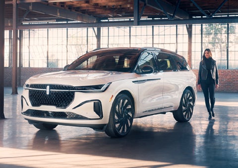 A person approaches a 2026 Lincoln Nautilus® SUV. | Zeigler Lincoln of Kalamazoo in Kalamazoo MI